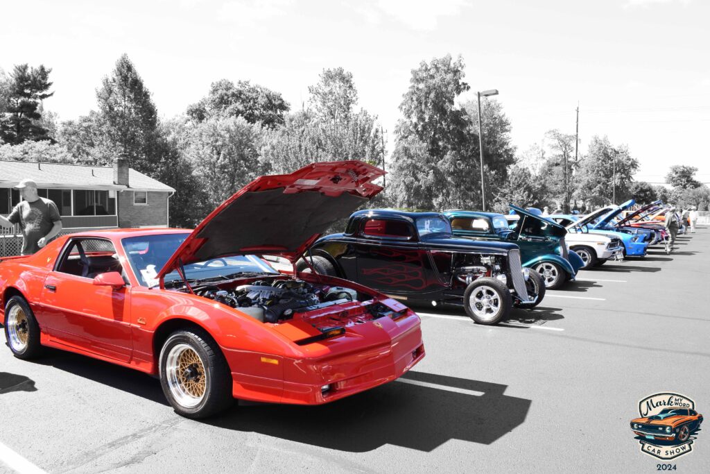 Long line of cars at the 2024 Mark My Word Car Show
