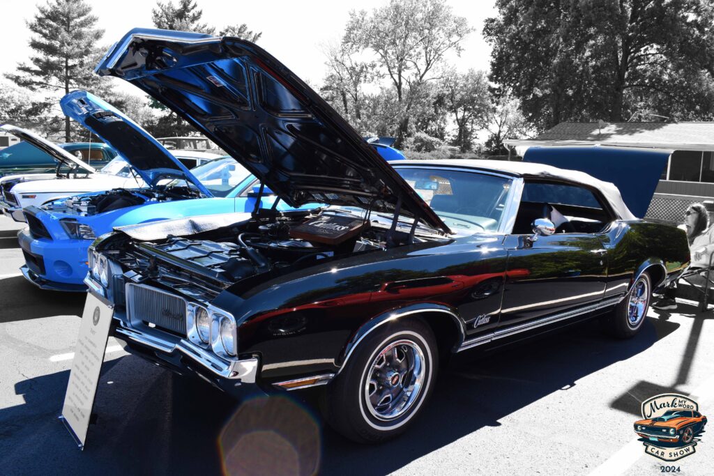 Glossy black 1970 Oldsmobile Cutlass convertible owned by Mary Lou Cutler, the original owner