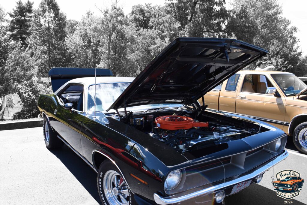Shiny black 1970 Plymouth Barracuda owned by Bruce