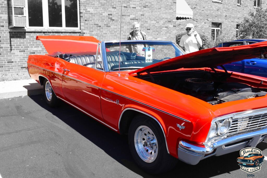 Bright red 1966 Chevy Impala in factory-original condition, owned by Bruce Williams