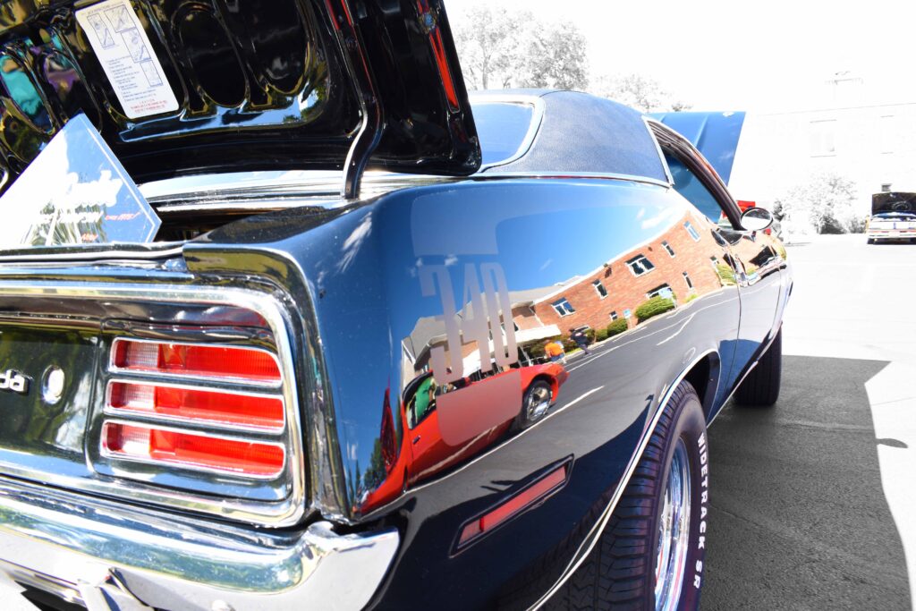Shiny black 1970 Plymouth Barracuda owned by Bruce