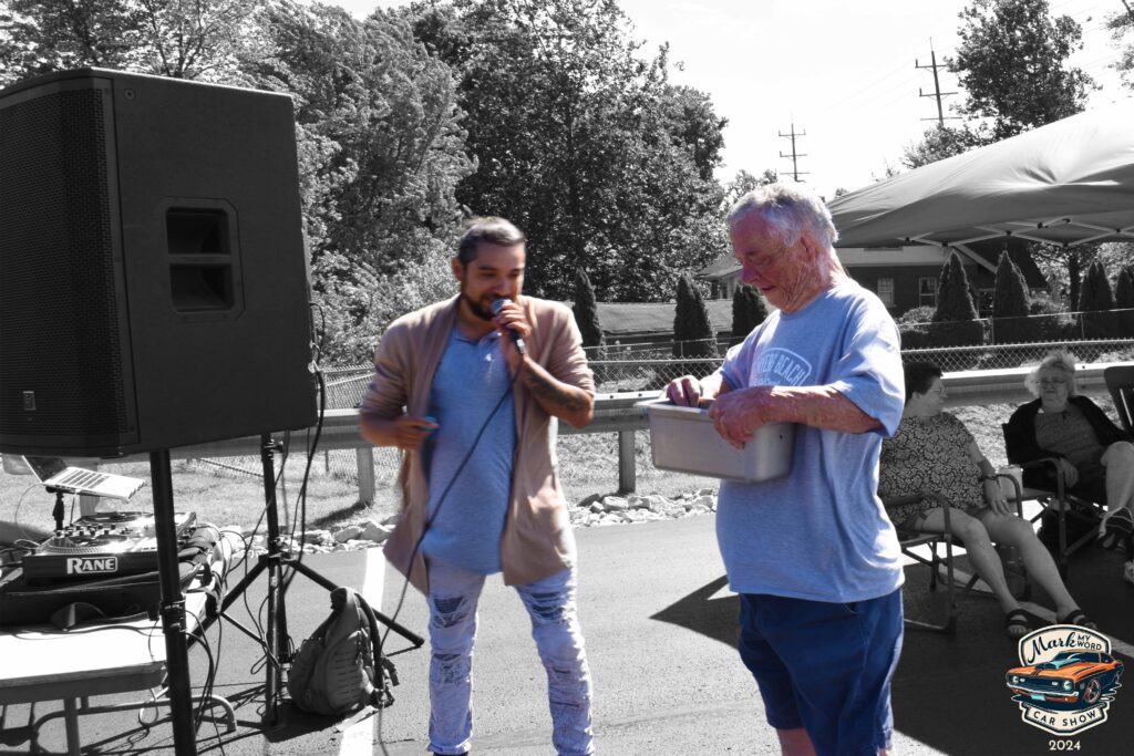 Mark Rodgers pulling winners for raffle prizes